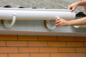 installing gutter into its base